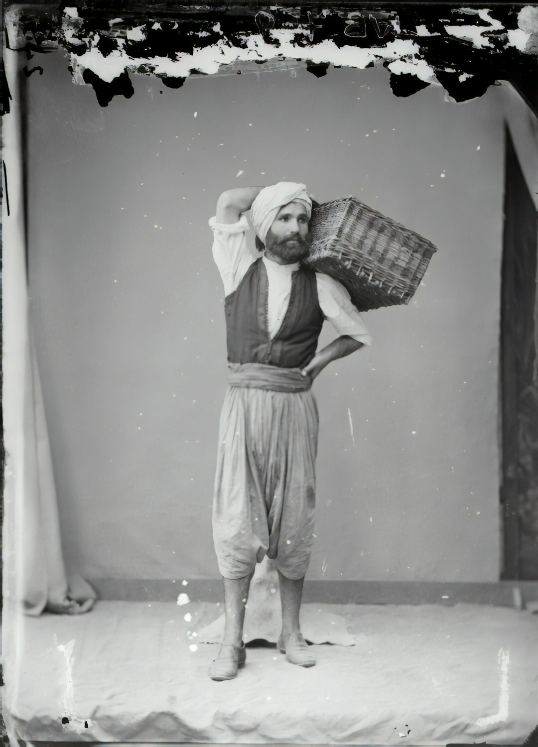Studio portrait of a male statistician with Turkish-German heritage