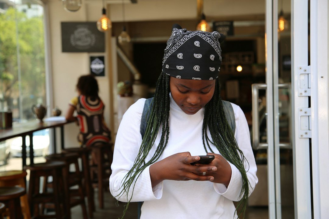 young person using phone